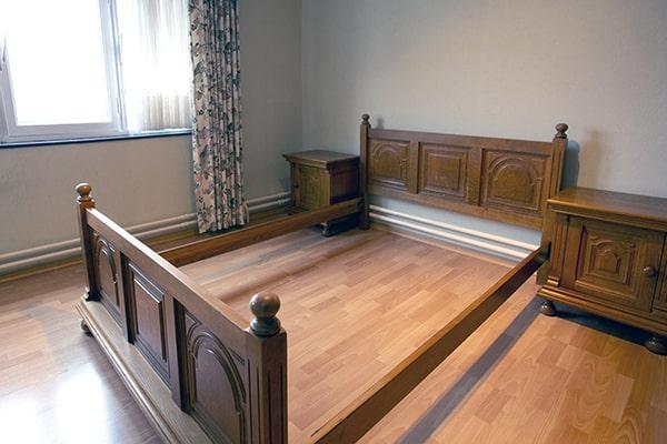 our bed frame removal process involves disassembly, removal, and disposal of the bed frame